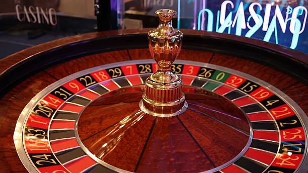 bolasot dashboard showing Jewels of Prosperity slot game and Liga 1 football markets together